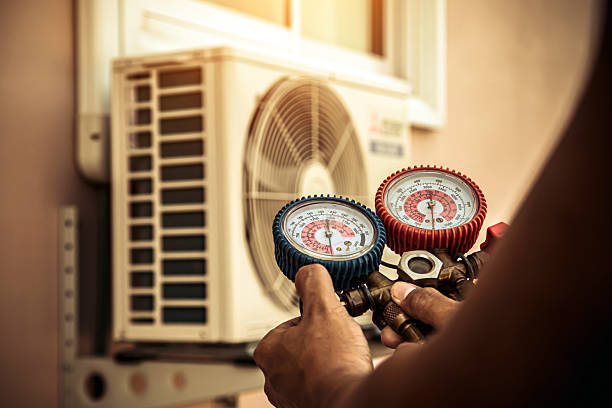 Professional Ductwork Repair technician working in Henry, IL